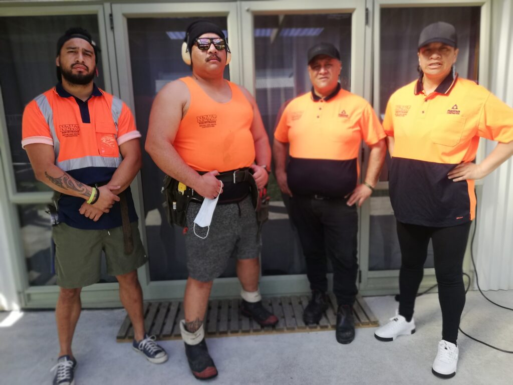 NZKiwitrader Paving and concrete team outside office